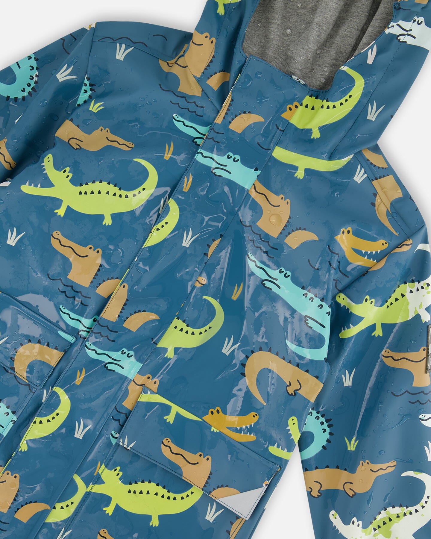 Blue Raincoat With Crocodiles That Change Color Upon Contact With Water-4